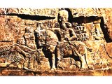 Valerian surrendering to the Persian king Shapur I, on a rock relief at Naqsh-i Ruslam.